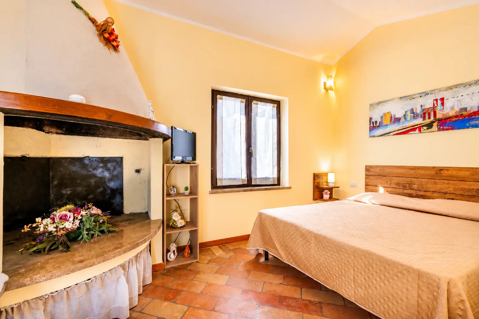 Bedroom with fireplace